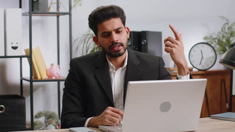 Businessman-working-on-laptop-at-office-talk-on-online-communication-video-call-with-employee,-boss