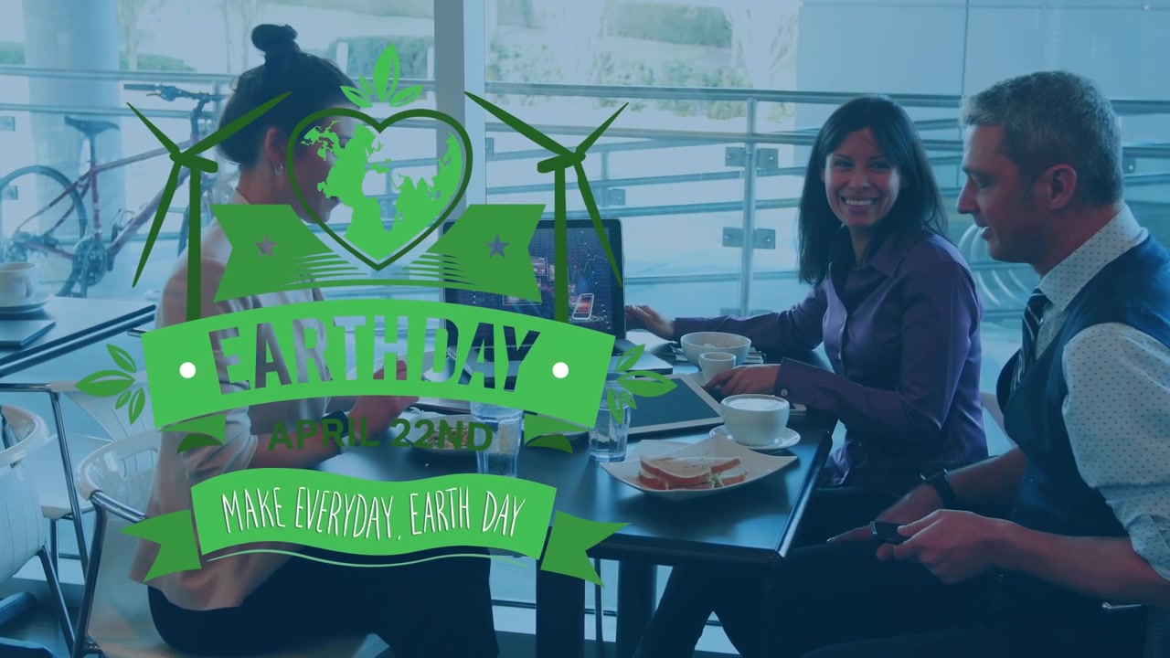 Animation of heart and earth day over diverse buisnesspeople talking