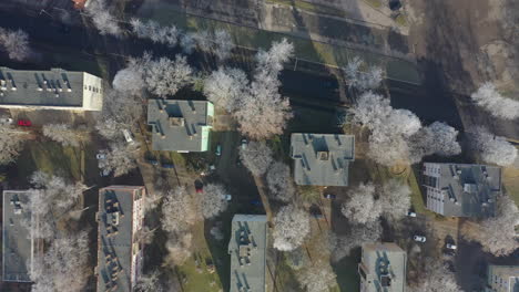 flying over city area in winter, hungary