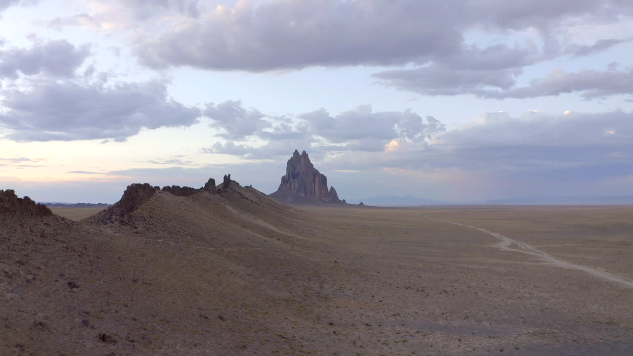 Premium stock video Shiprock new mexico edge of sunset and blue hour in 4k