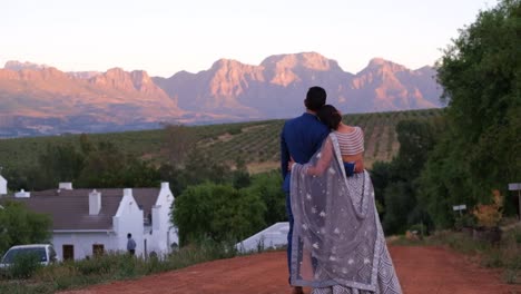 portrait of a sweet indian hindu couple looking on scenic nature