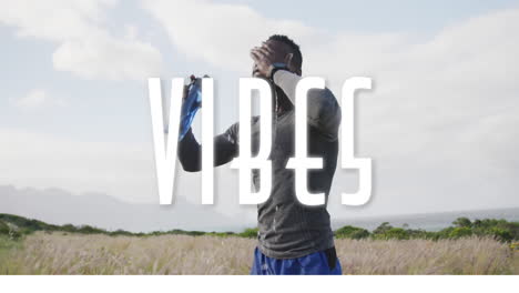 animation of the word vibes written in white over man exercisng in countryside drinking water