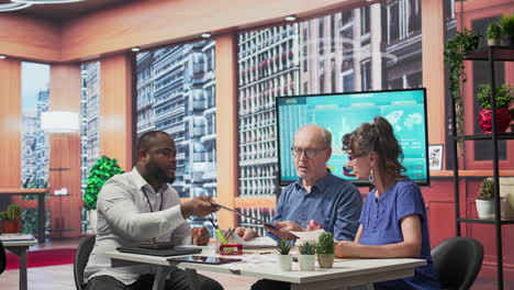 senior clients asking a financial advisor about various retirement options