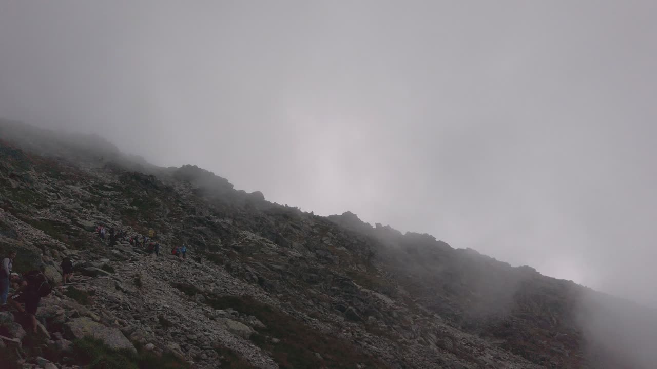 Group of People Climbing To krivan Mountain in Slovakia - Aerial shot