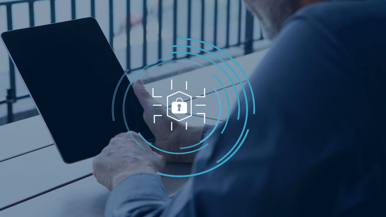 Man placing and tapping tablet on terrace, animating security HUD with lock icon, unlocking device