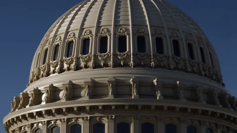 close-up of the u.s. capitol building dome against a blue sky