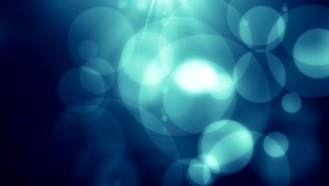 partículas de polvo azul abstracto luz bokeh títulos de movimiento bucle de fondo cinematográfico