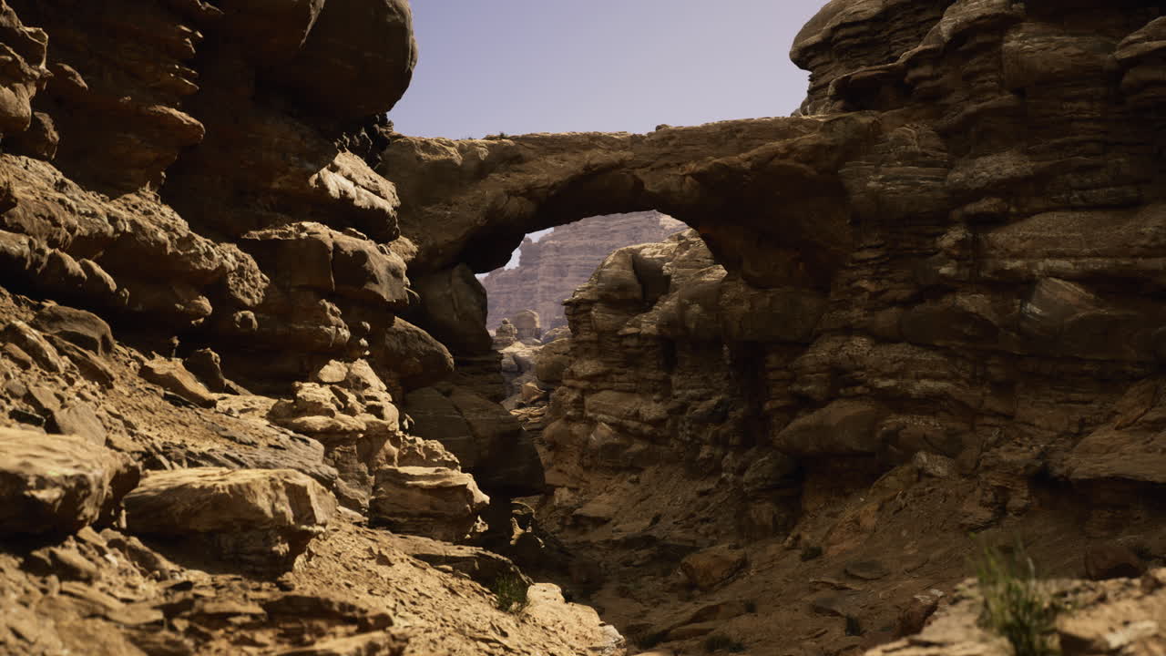 Stunning rock arch formation in a remote desert canyon landscape