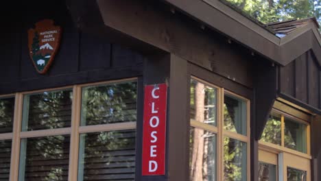 Pan-right-of-closed-park-ranger-kiosk-at-entrance-to-Yosemite-National-Park-during-Government-shutdown