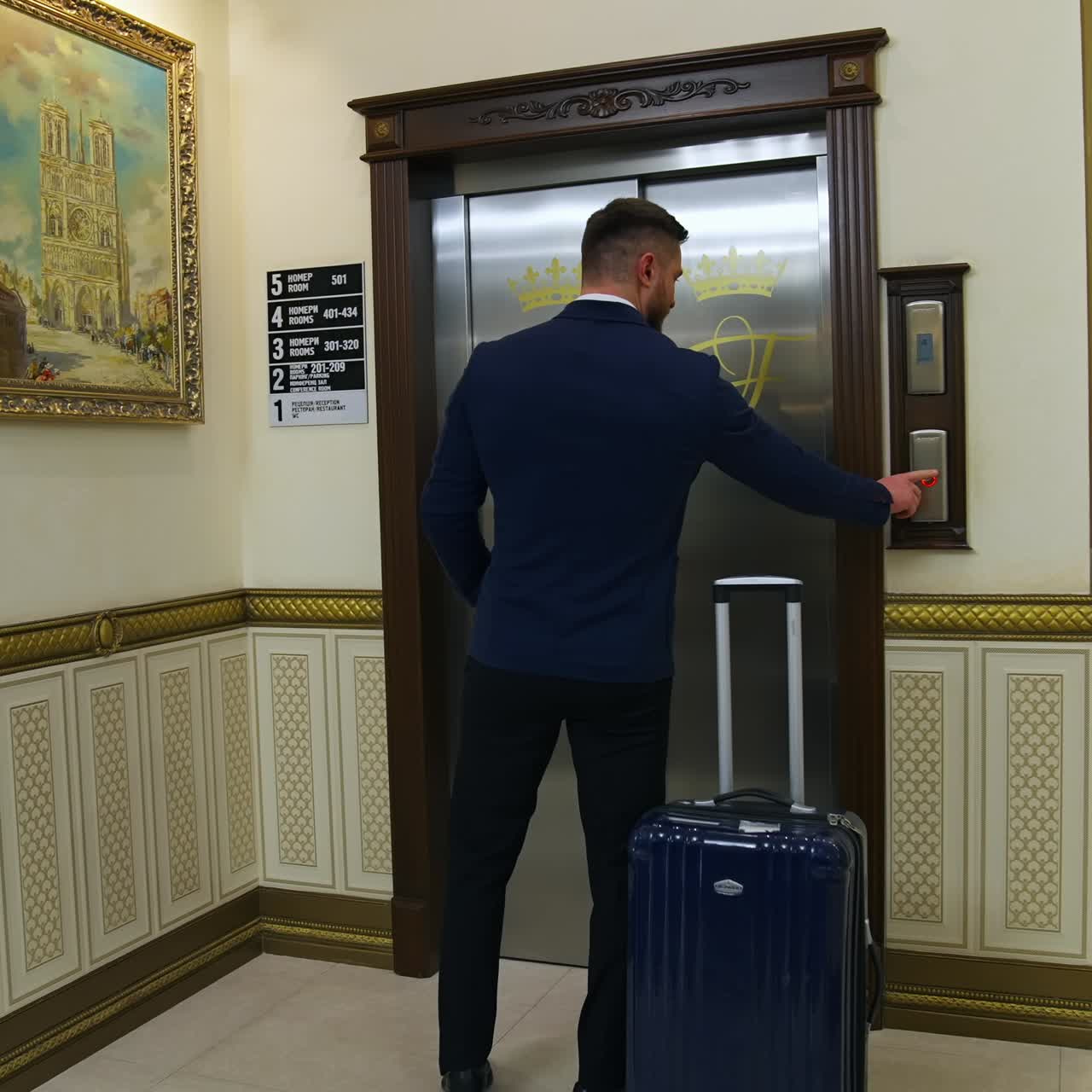 Traveler in hotel hallway