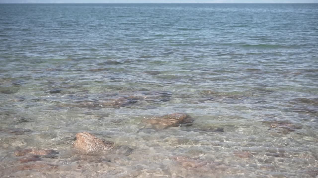 Seascape with rocks and clear water