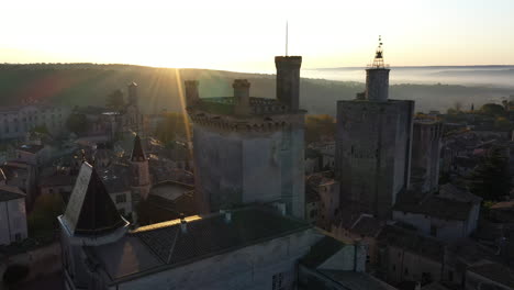 sunrise-over-Uzes-Gallo-Roman-city-France-Gard-aerial-view-of-the-Duke's-castle