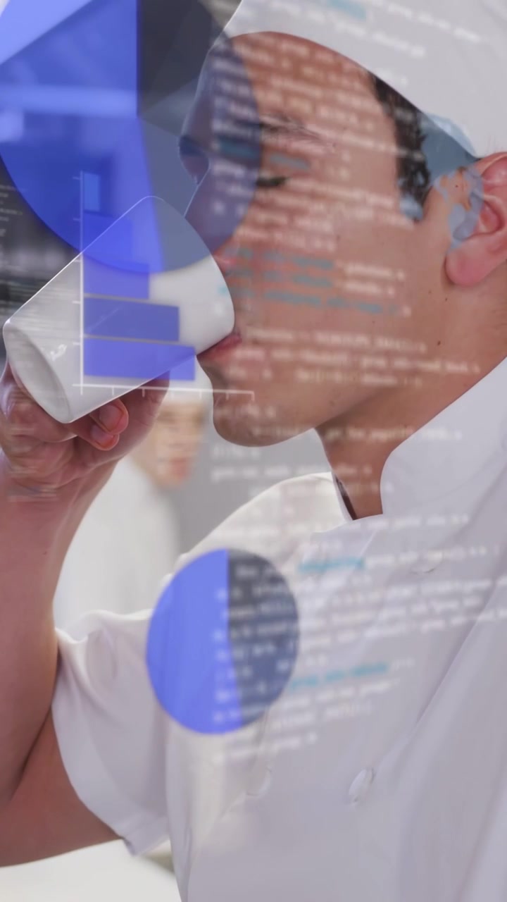 Male chef lifting mug and sipping, causing blue overlays showing kitchen stats as camera zooming