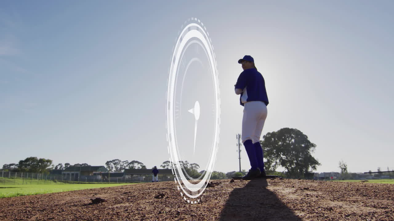 Baseball player on mound with circular digital animation overlaying scene