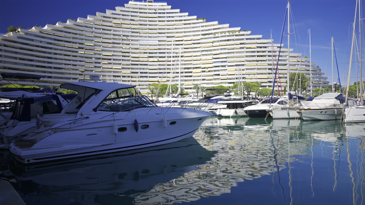 Villeneuve-Loubet, France - June 7, 2025: Boats docked in the Marina Baie des Anges in daylight