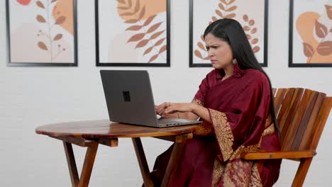 confused woman using laptop