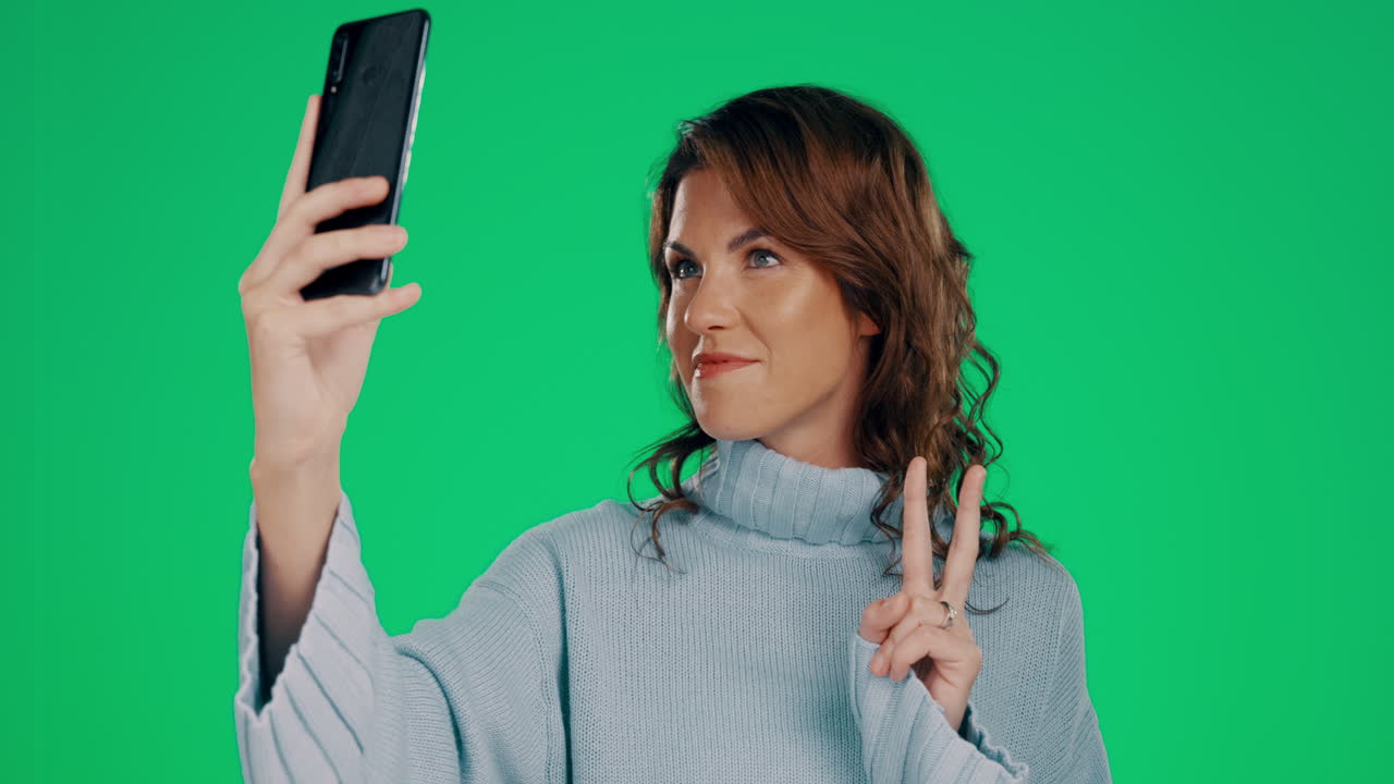Woman, peace sign and smile for selfie