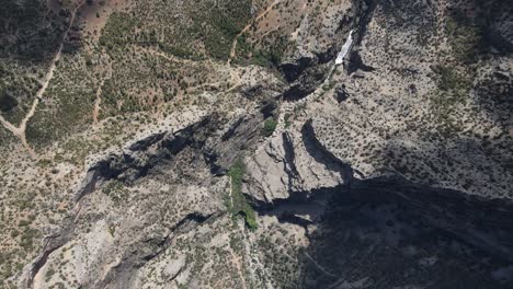 Overhead-view-of-the-wind-panel-installed-on-the-top-of-the-mountain,-aerial-view-of-side-by-side-wind-panels