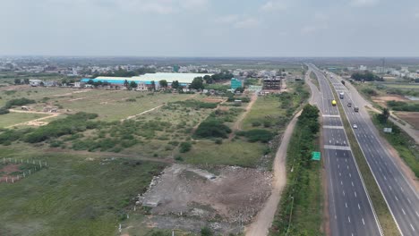 aerial view of large manufacturing hubs and their surrounding landscapes in hyderabad.