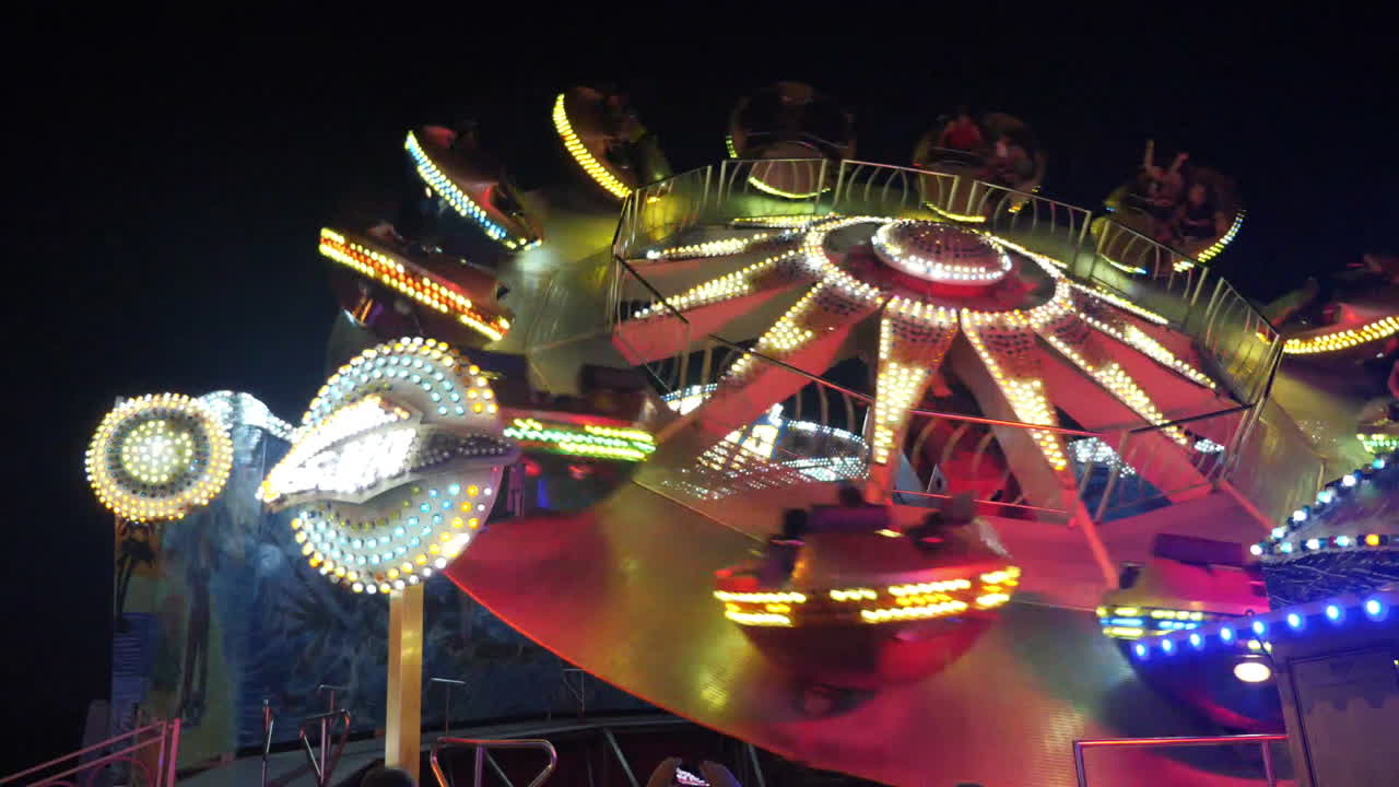 Premium stock video - Thrill ride at night at the cleveland county fair ...