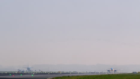 airplane taking off in foggy conditions