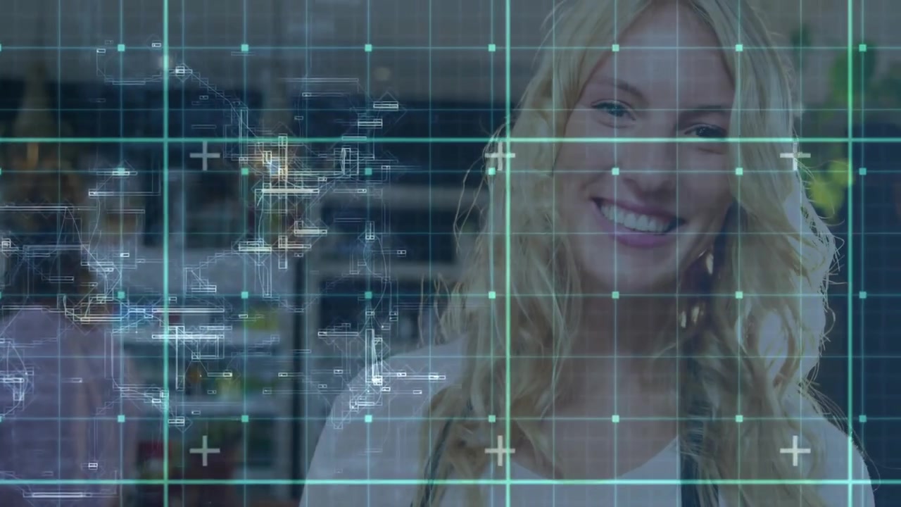 smiling woman exploring tech lab in modern office, displaying grid overlay and circuit lines