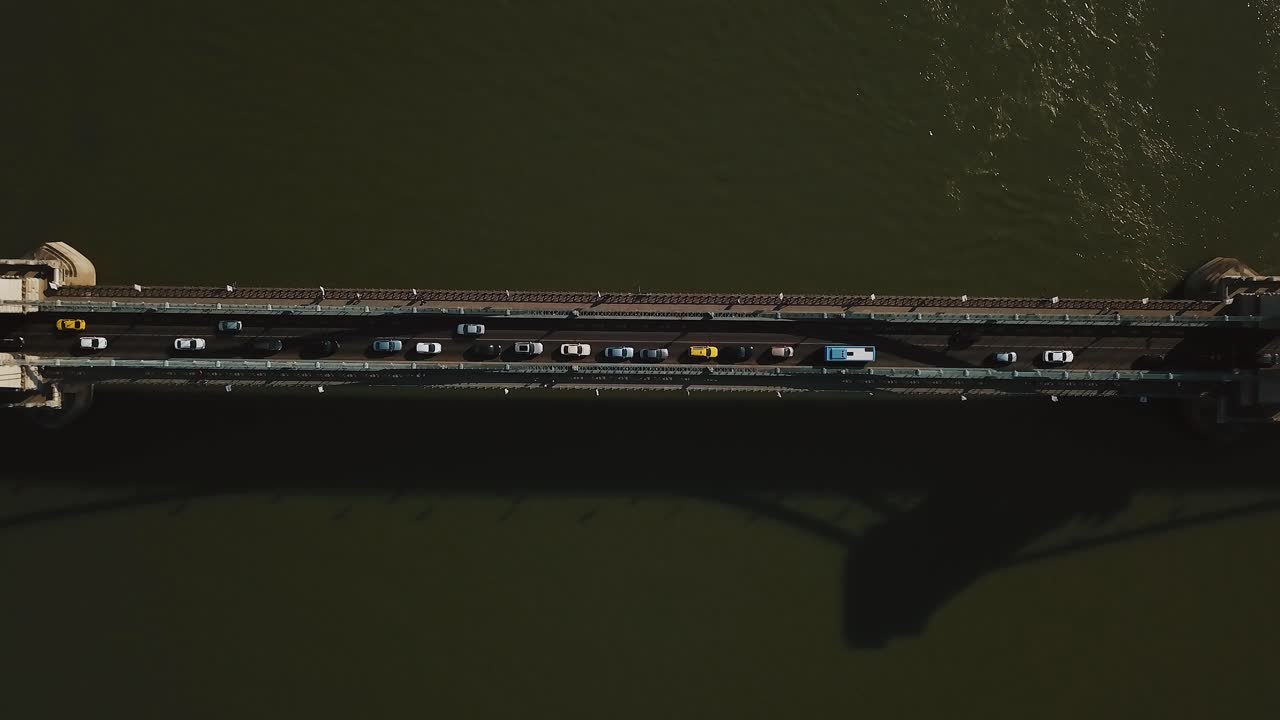 Aerial View of Cars Crossing a Bridge