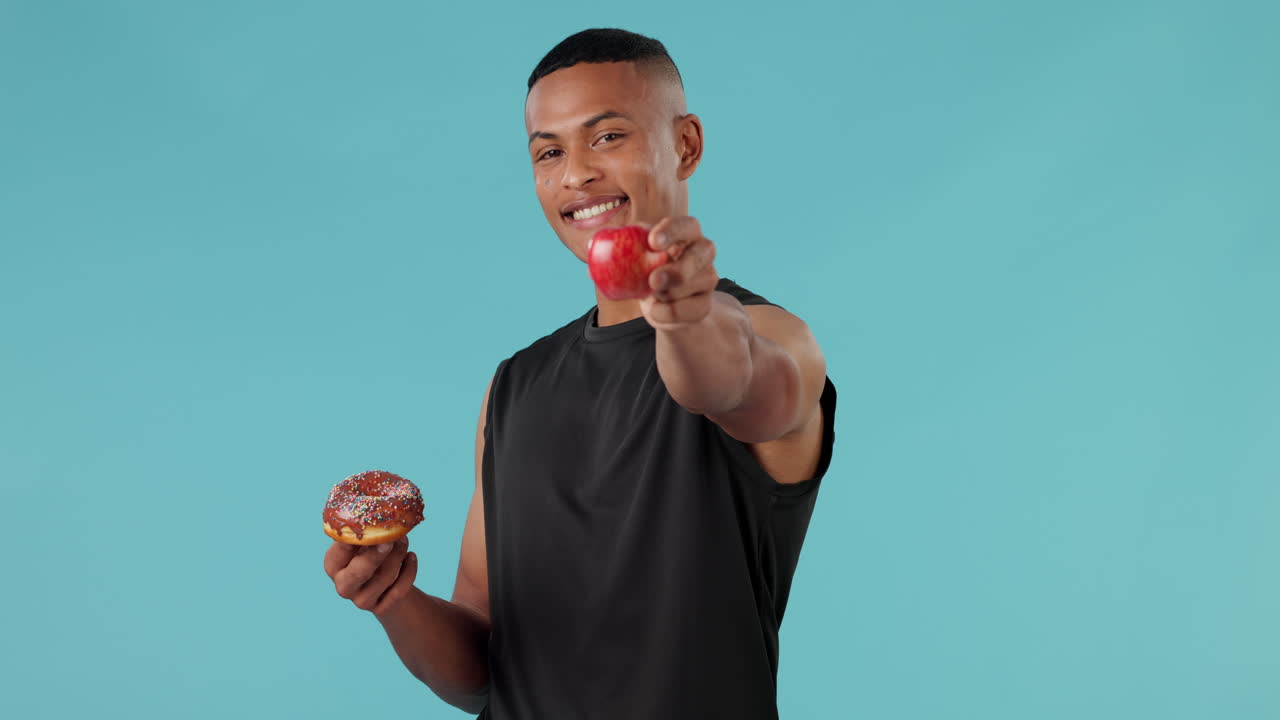 Apple, donut and choice with face of man in studio
