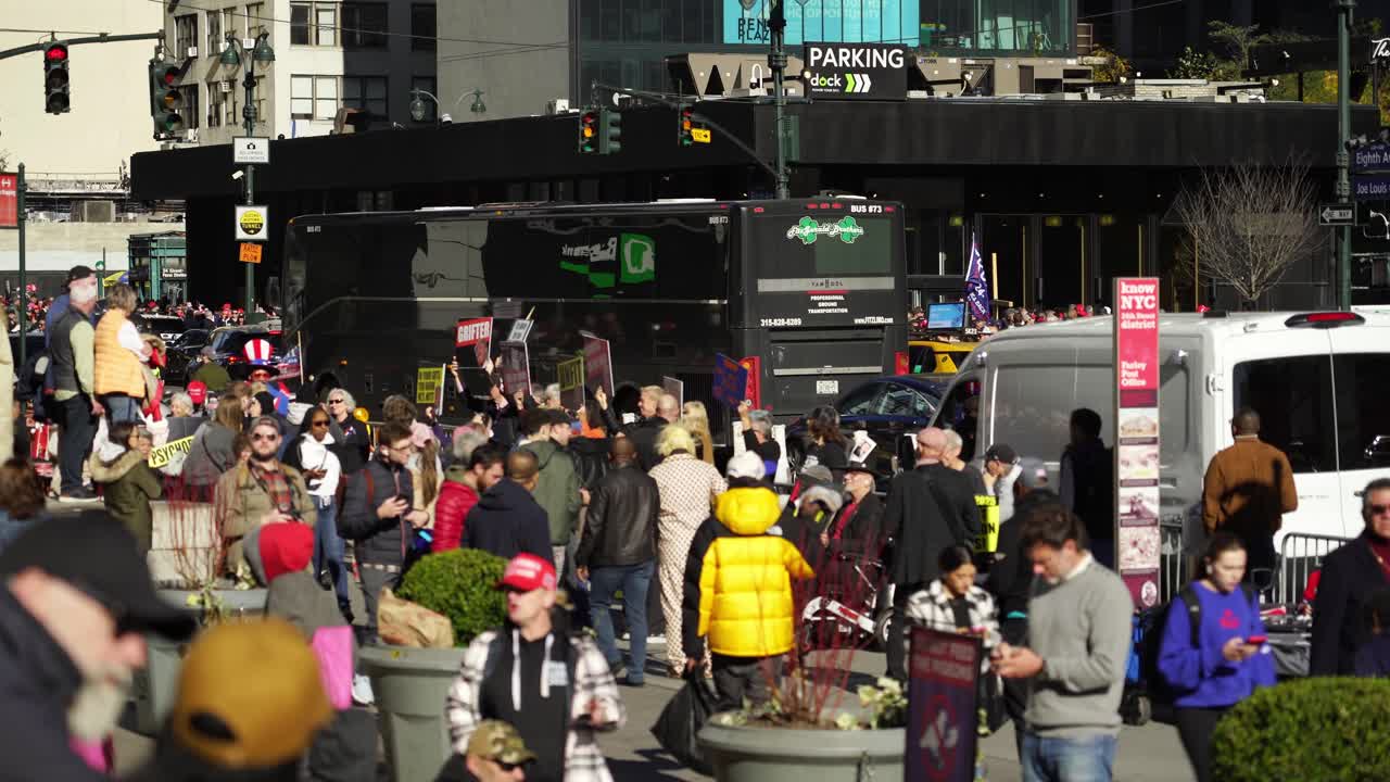Trump supporters gather near Madison Square Garden, their enthusiasm amplified by the bright sunlight and the vibrant New York atmosphere