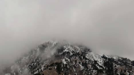 Enveloping-Misty-Clouds-Over-Snowcapped-Mountains-At-Nevado-de-Colima-National-Park-In-Mexico