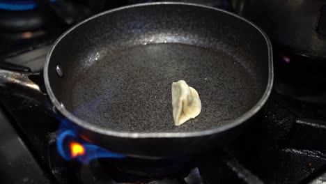 cooking pasta stuffed with meat in slow motion