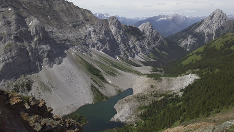 mountain valley with lake in backcountry rockies kananaskis alberta canada