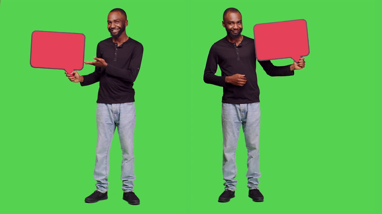 Man Holding and Pointing to a Speech Bubble on Green Screen