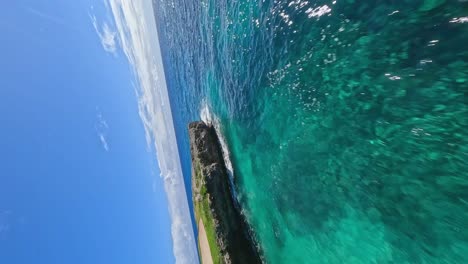 Vertical-Shot-Of-Corales-Golf-Course-In-Punta-Cana,-Dominican-Republic---aerial-FPV