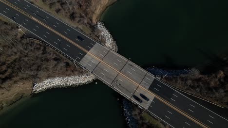 an aerial view over a highway on long island, ny on a sunny day