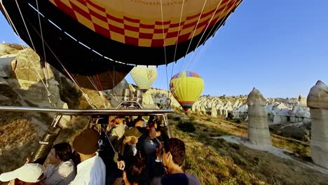 see cappadocia’s surreal landscape lit by sunrise, high above in a hot air balloon—an unforgettable experience