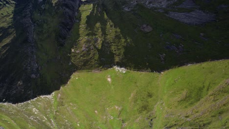 a sharp, grassy ridge capturing the rugged beauty of the austrian alps in a small village called mayrhofen known for hiking