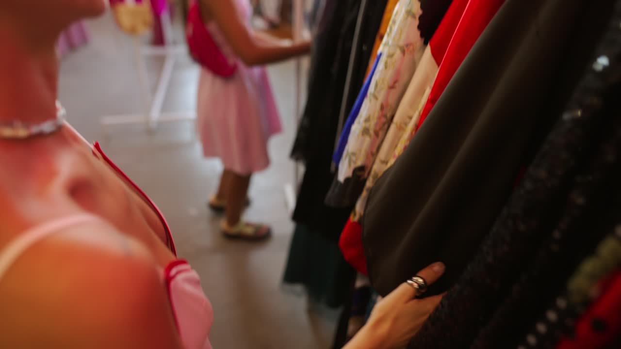 Woman Shopping for Clothes at a Vintage Store