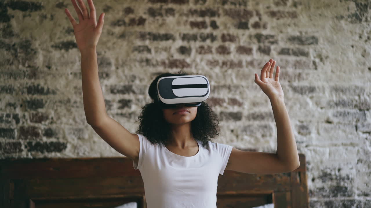 Woman experiencing virtual reality in a bedroom