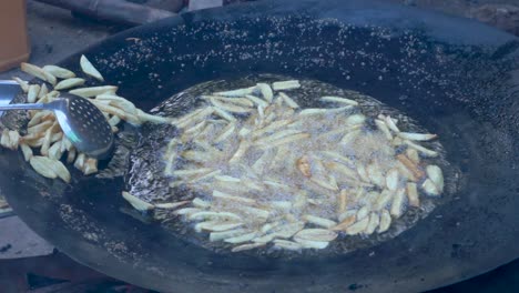 Graduation-party-turned-to-be-a-huge-feast-to-the-guest,-making-chips-is-necessary-dish-for-the-guests