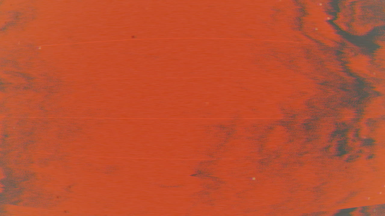 primer plano áspero y texturizado de la superficie roja y negra con puntos blancos