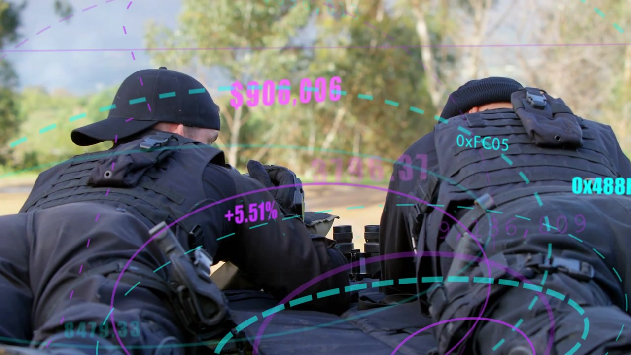 Dos operadores tácticos tumbados boca abajo en una colchoneta de tiro, el operador de la izquierda levantando el rifle y actualizando el HUD de RA para apuntar