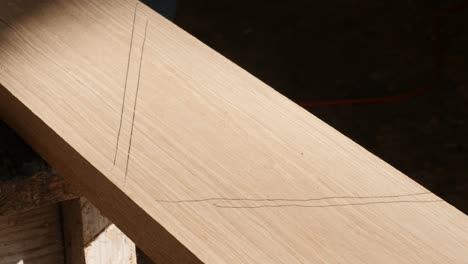 carpenter's markings on oak wood for cutting
