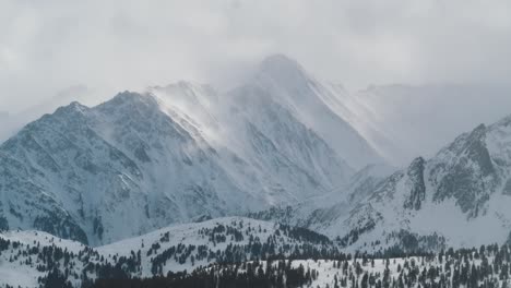 time lapse from clouds rolling over the mountains