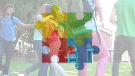 animation of connected jigsaw puzzle pieces over happy diverse student jumping in excitement