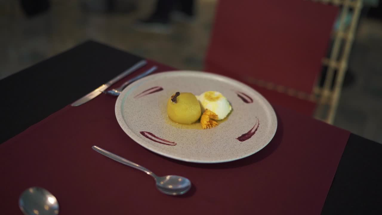 Elegant Pear and Custard Dessert on a Restaurant Table