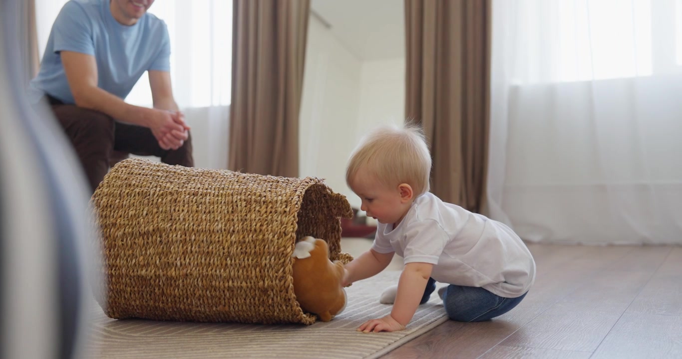 Curious Baby Crawls Towards Wicker Basket to Discover Toy