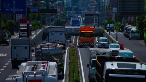 a timelapse of the traffic jam at the urban street in tokyo long shot