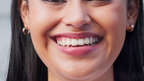 face, closeup and mouth of woman with a smile