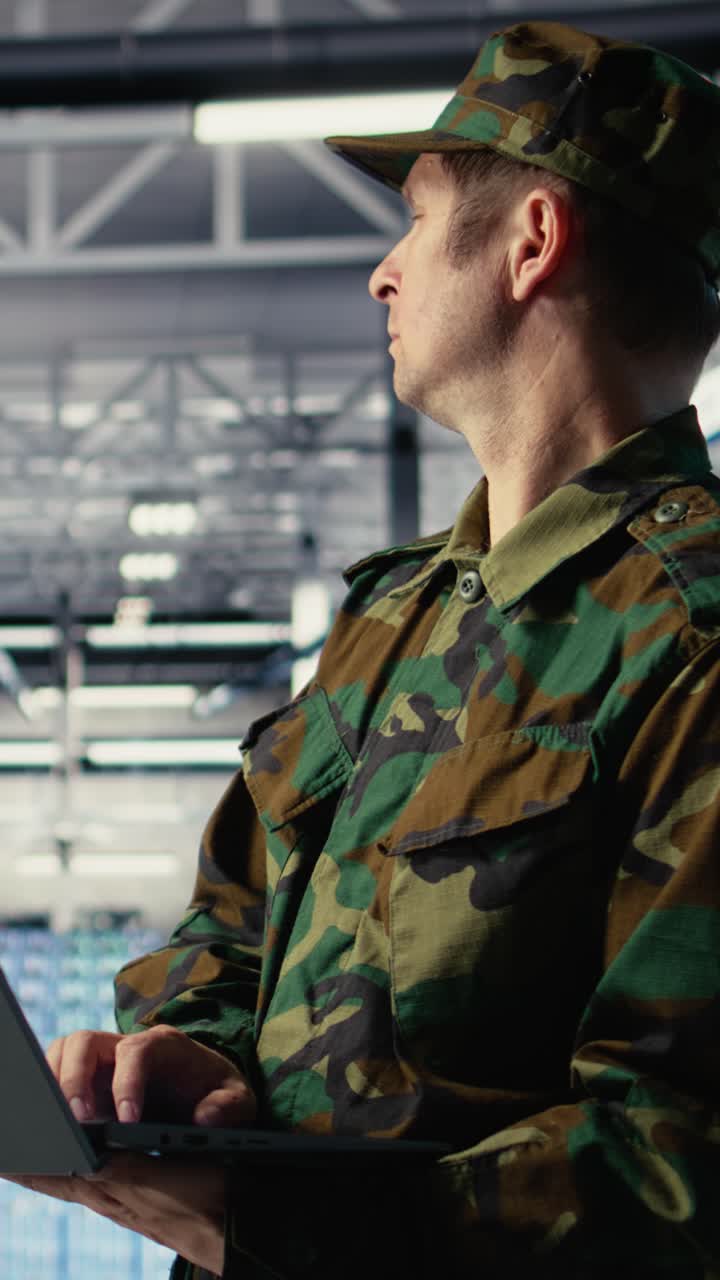 Vertical Video Army Software Developer In Server Hub Uses Artificial Intelligence App On Laptop